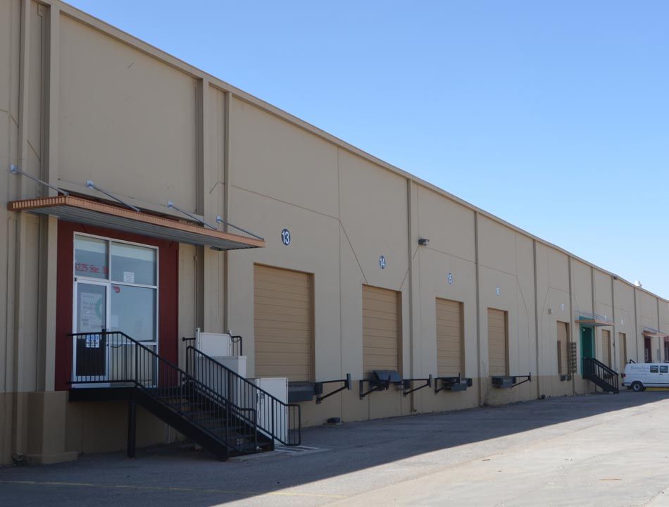 A large building with a lot of doors and stairs