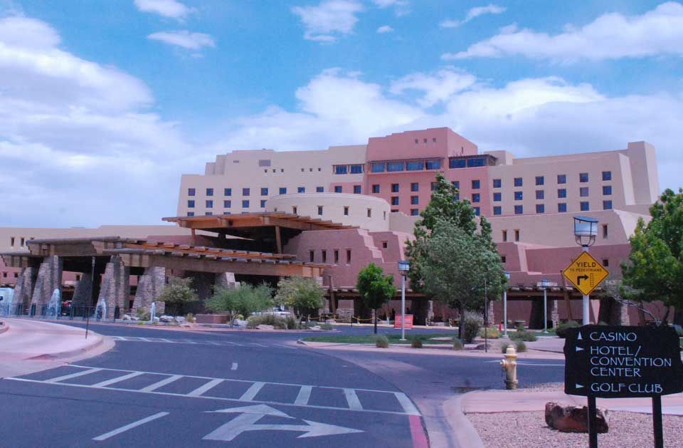 A large building with a golf club sign in front of it