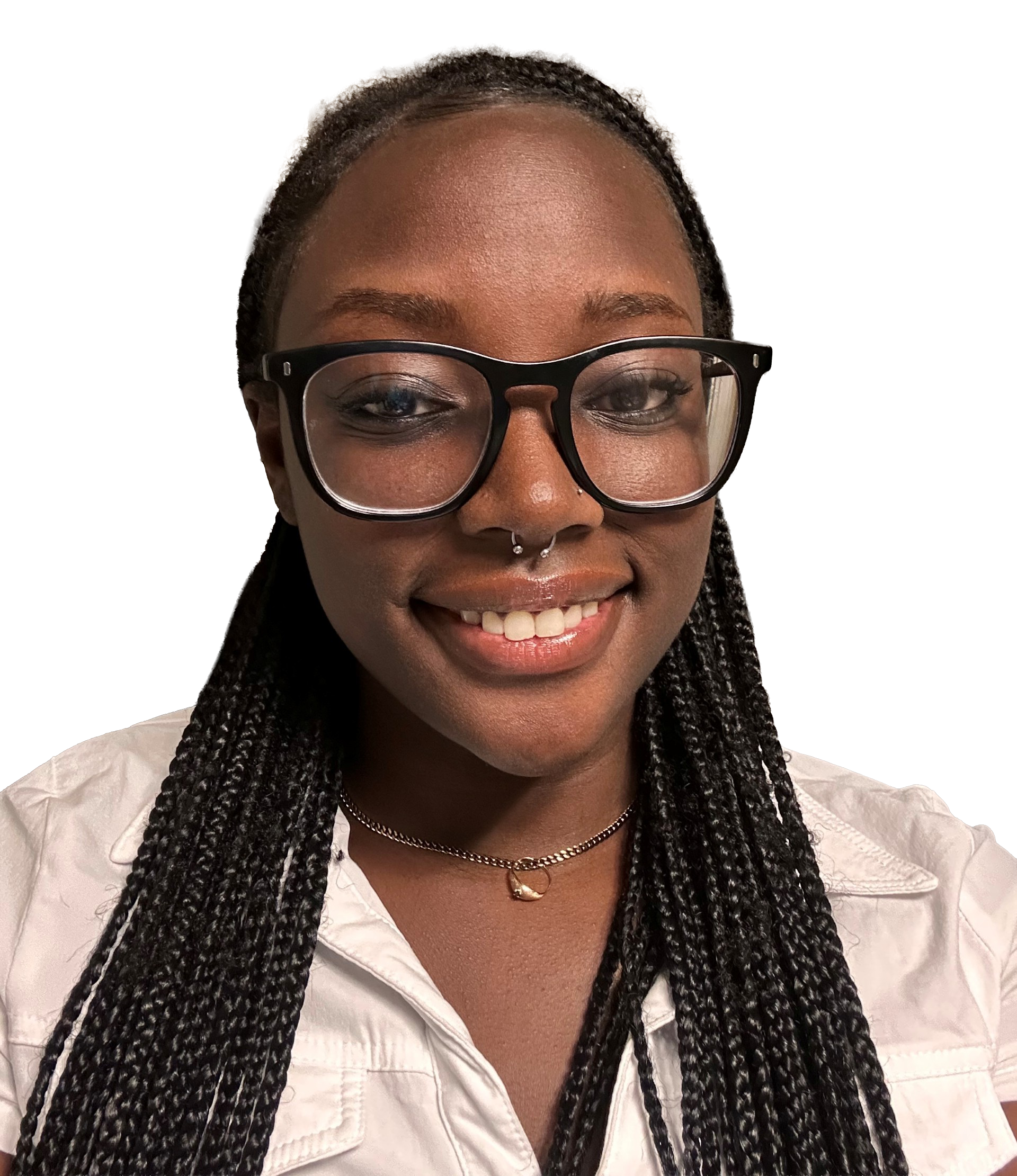 A woman wearing a plaid shirt and a brown tank top is smiling.