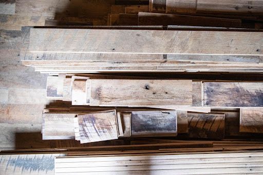 reclamed barn wood on the floor of a barn