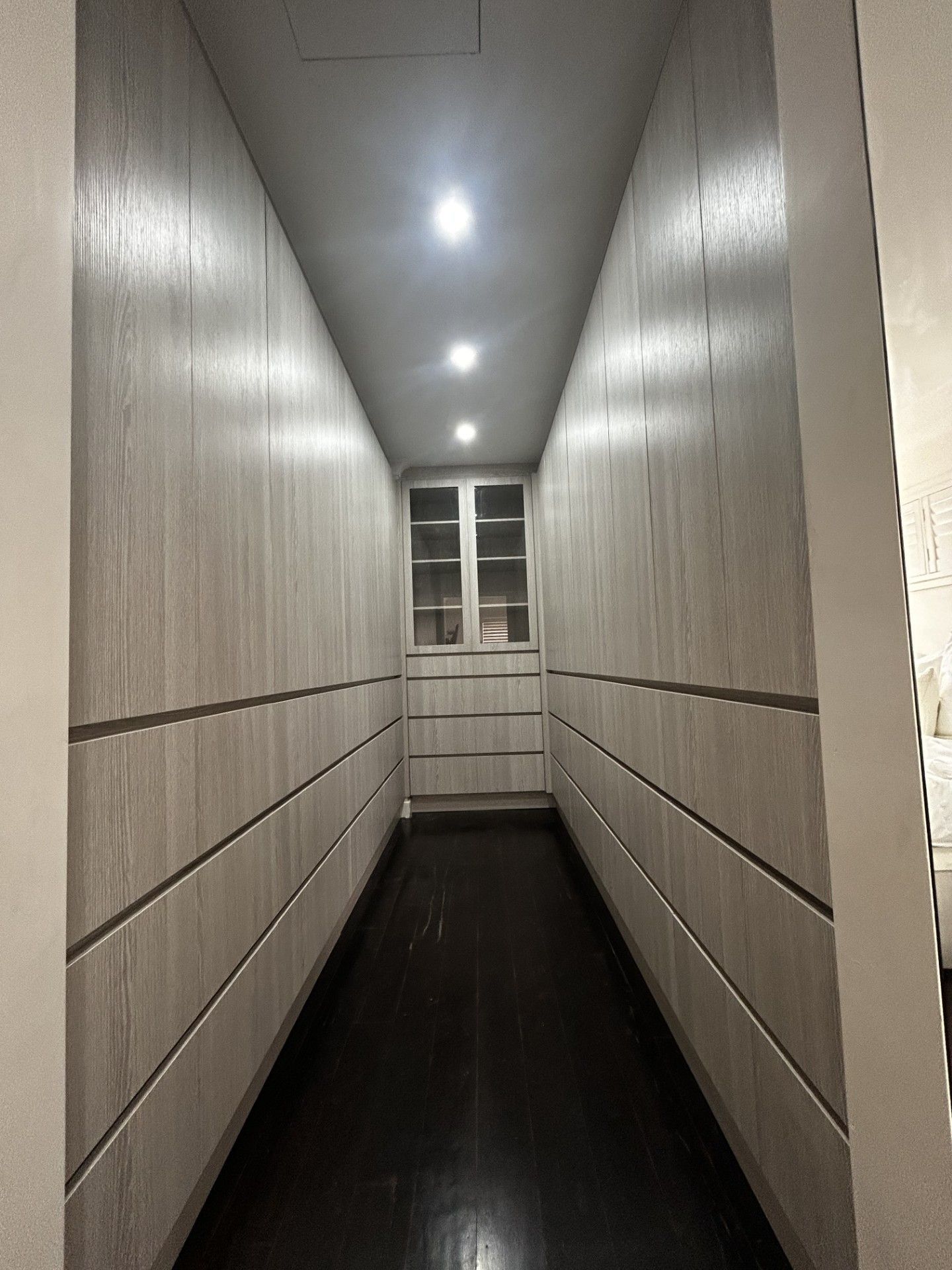 Built-In Light Oak Closet With Shelves And Hanging Rods — Protech Renovations & Joinery in Gregory Hills, NSW