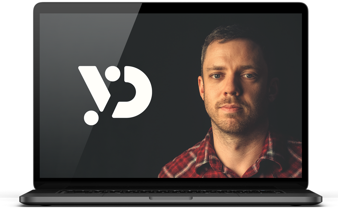 Laptop screen showing a man beside a white logo on a dark background