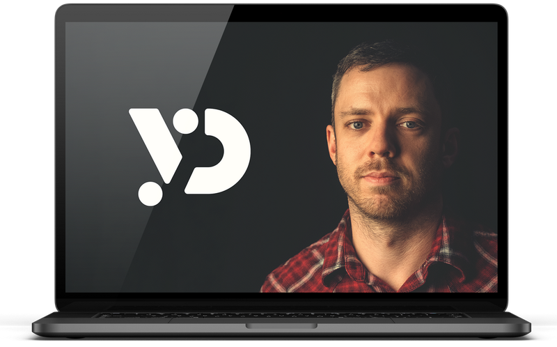 Laptop screen showing a man beside a white logo on a dark background