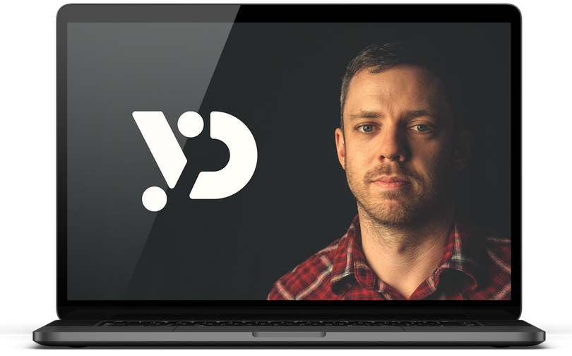 Laptop screen showing a man beside a white logo on a dark background
