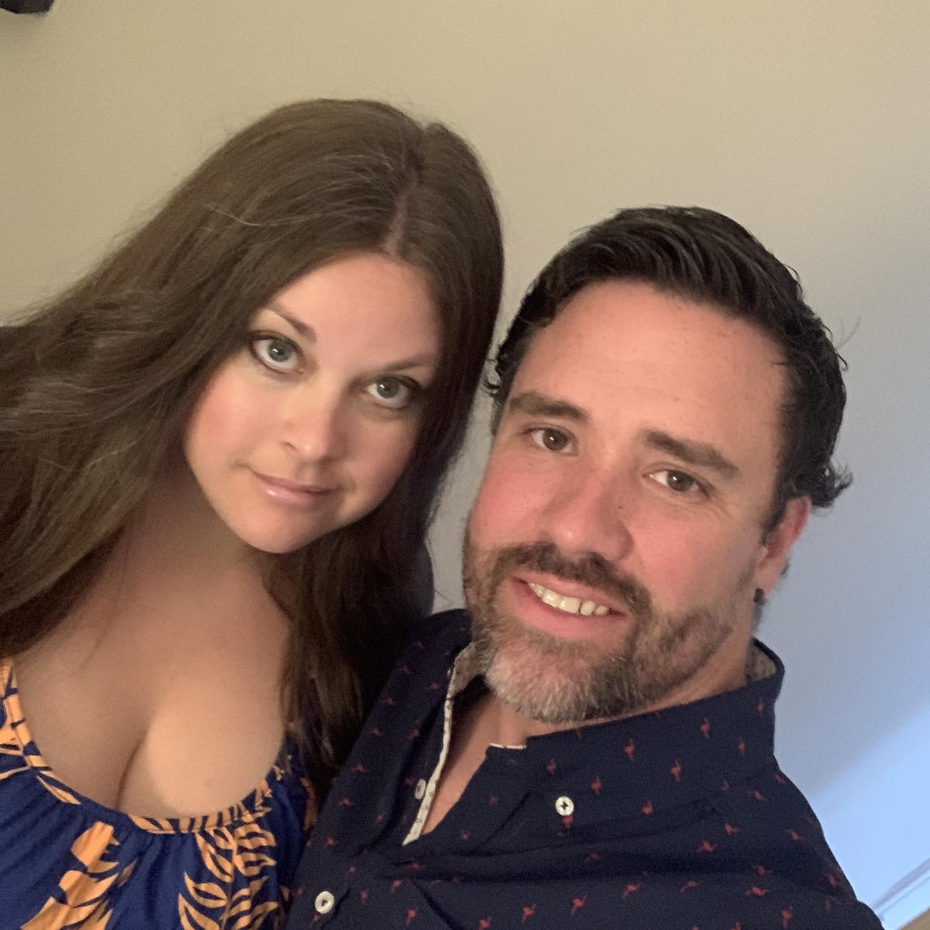 Steven Taylor & Jenn Taylor taking a selfie.