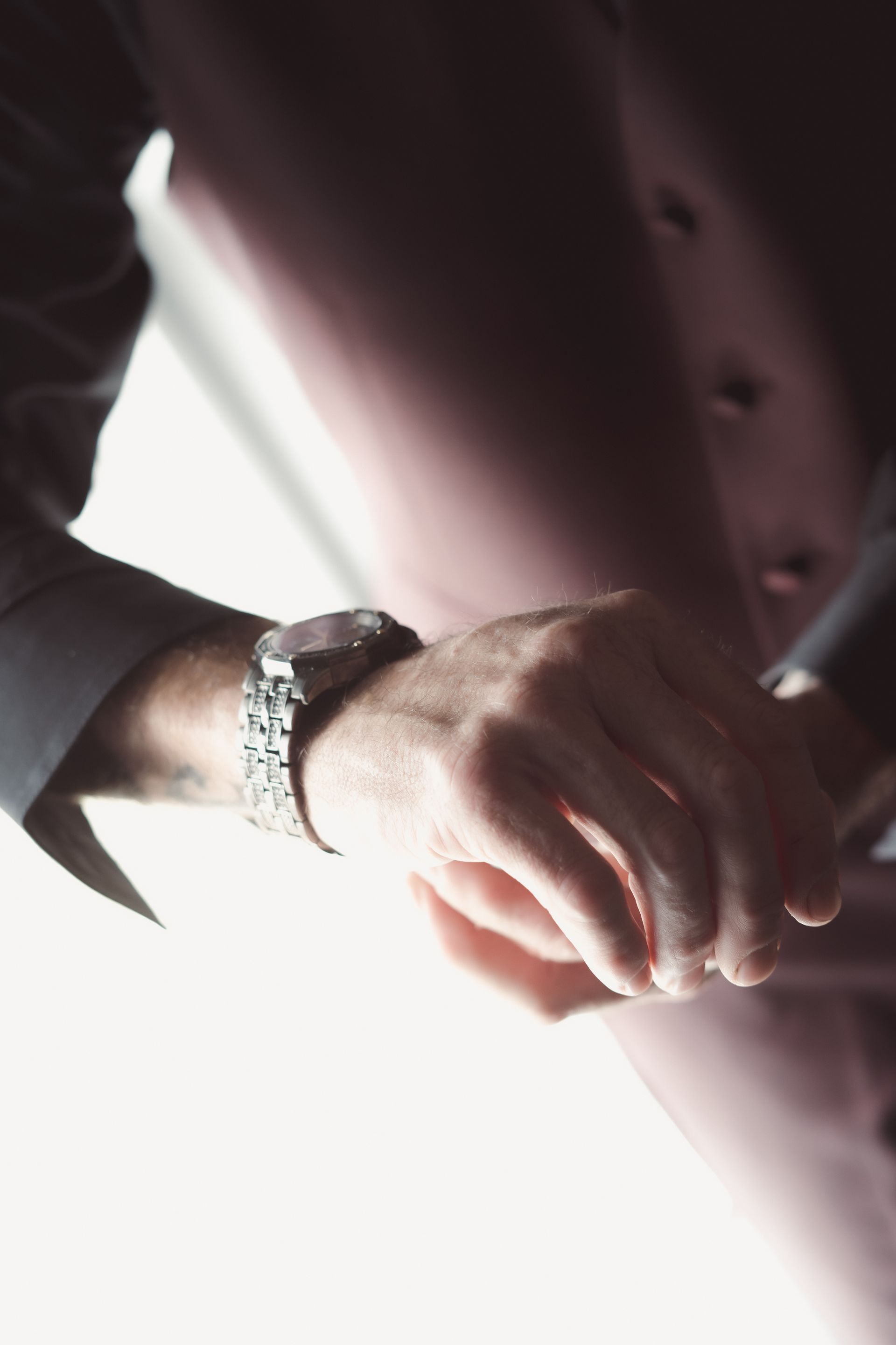 groom looking at watch, Retro Suites Hotel, vintage wedding