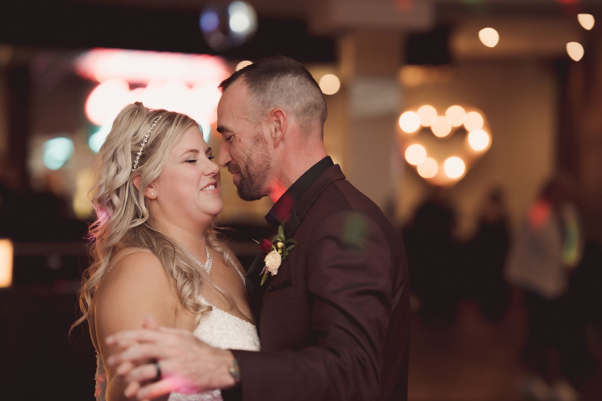 bride and groom, first dance at each other, background out of focus, Retro Suites Hotel, vintage wedding