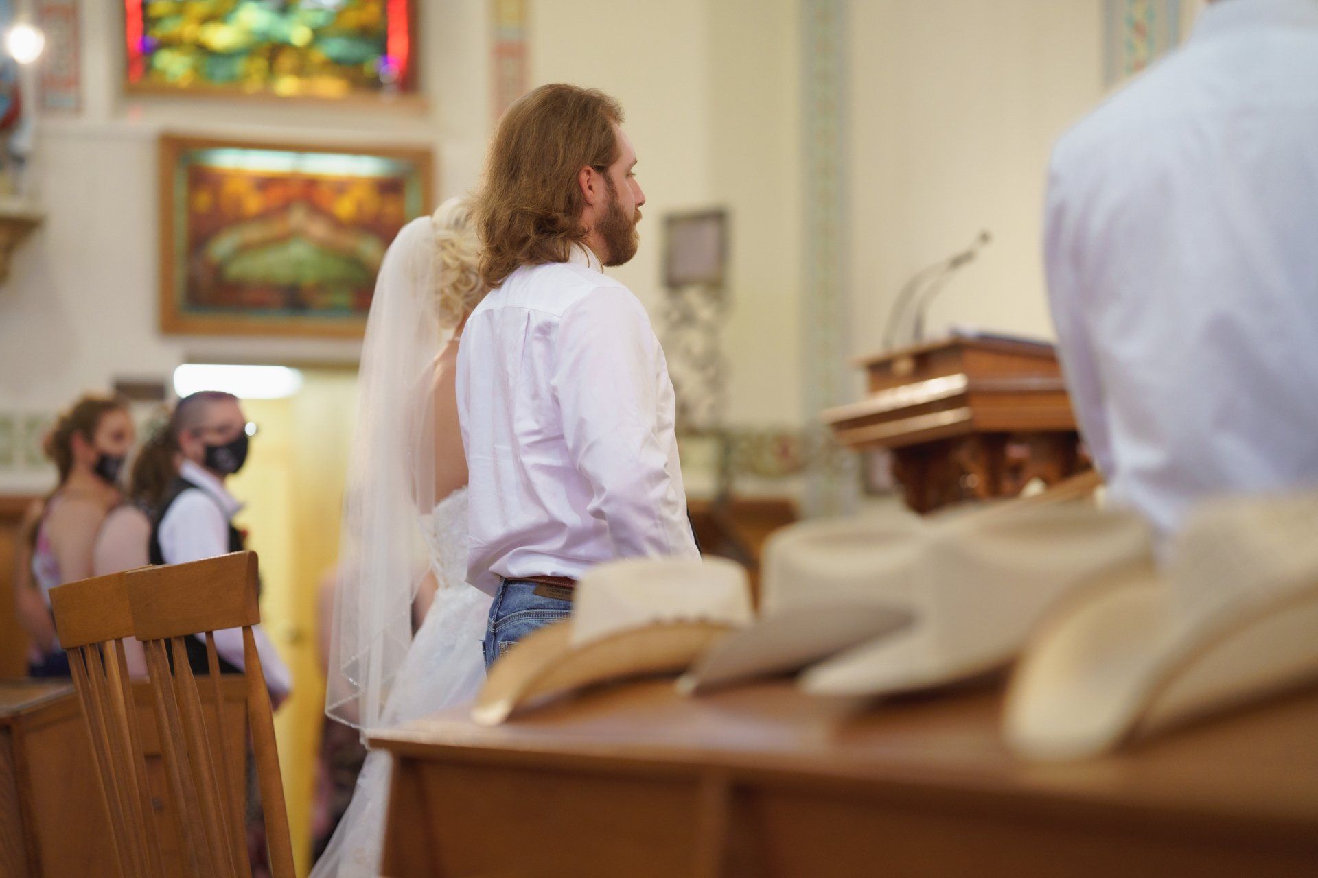 A bride and groom are getting married in a church.