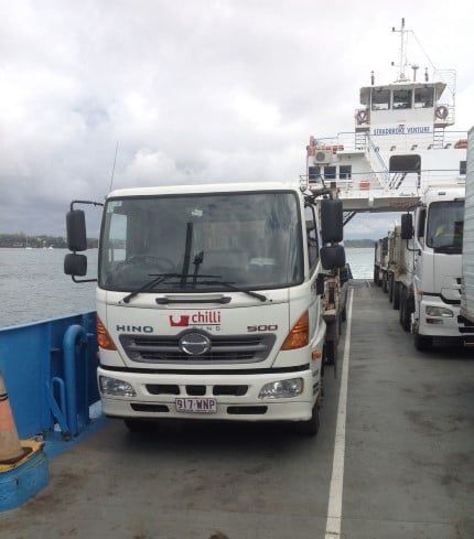 Business Skip Bin Truck on Ferry — Chilli Bins Skip Bins in Glenview, QLD