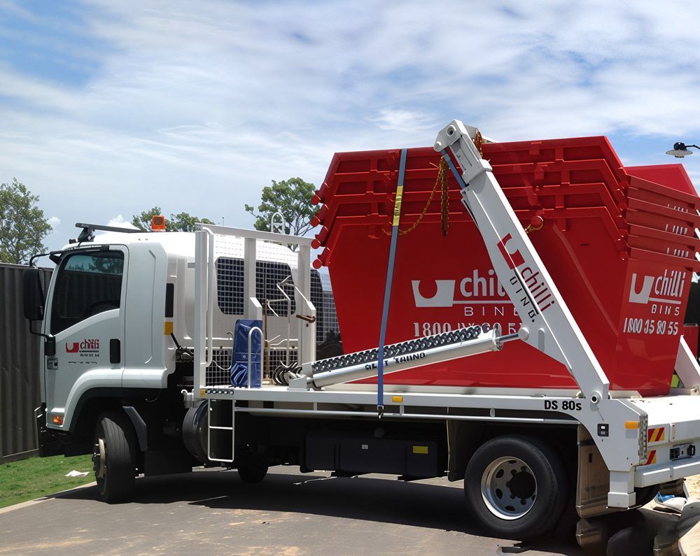 Truck With Commercial Skip Bins