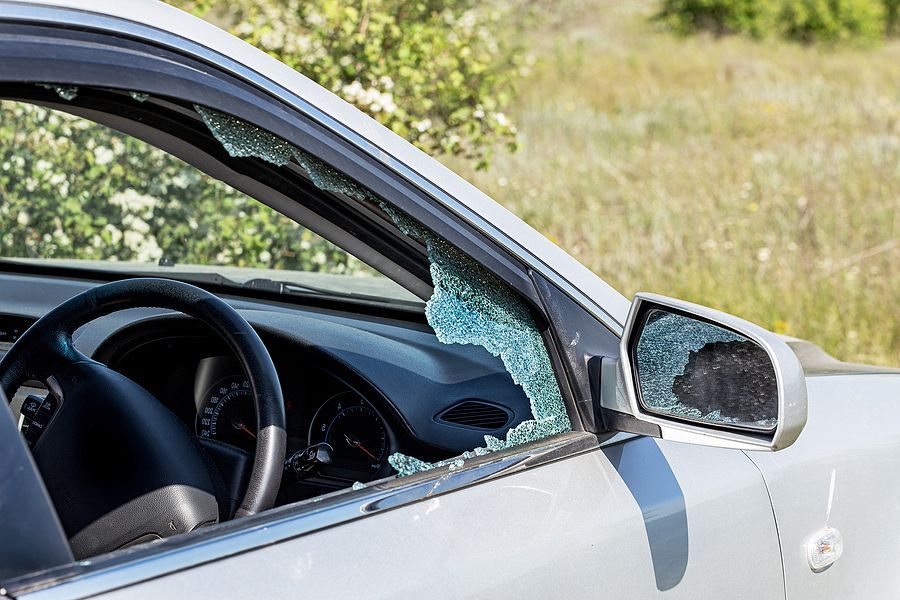 a broken windshield of a car with a broken windshield