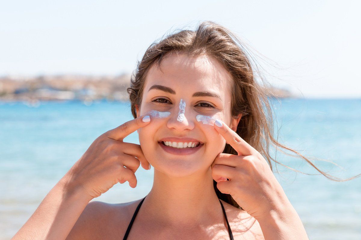 Woman with Sunscreen on Her Face — Australia — Sunsational Sunscreen