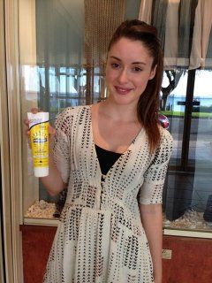 Woman Holding Sunsational Sunscreen — Kensington, NSW — Sunsational Sunscreen