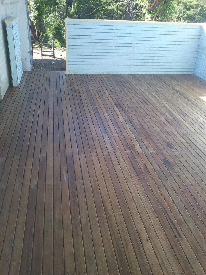 Wooden deck with light blue slatted fence, outdoors. — Truecraft Services in Biboohra, QLD