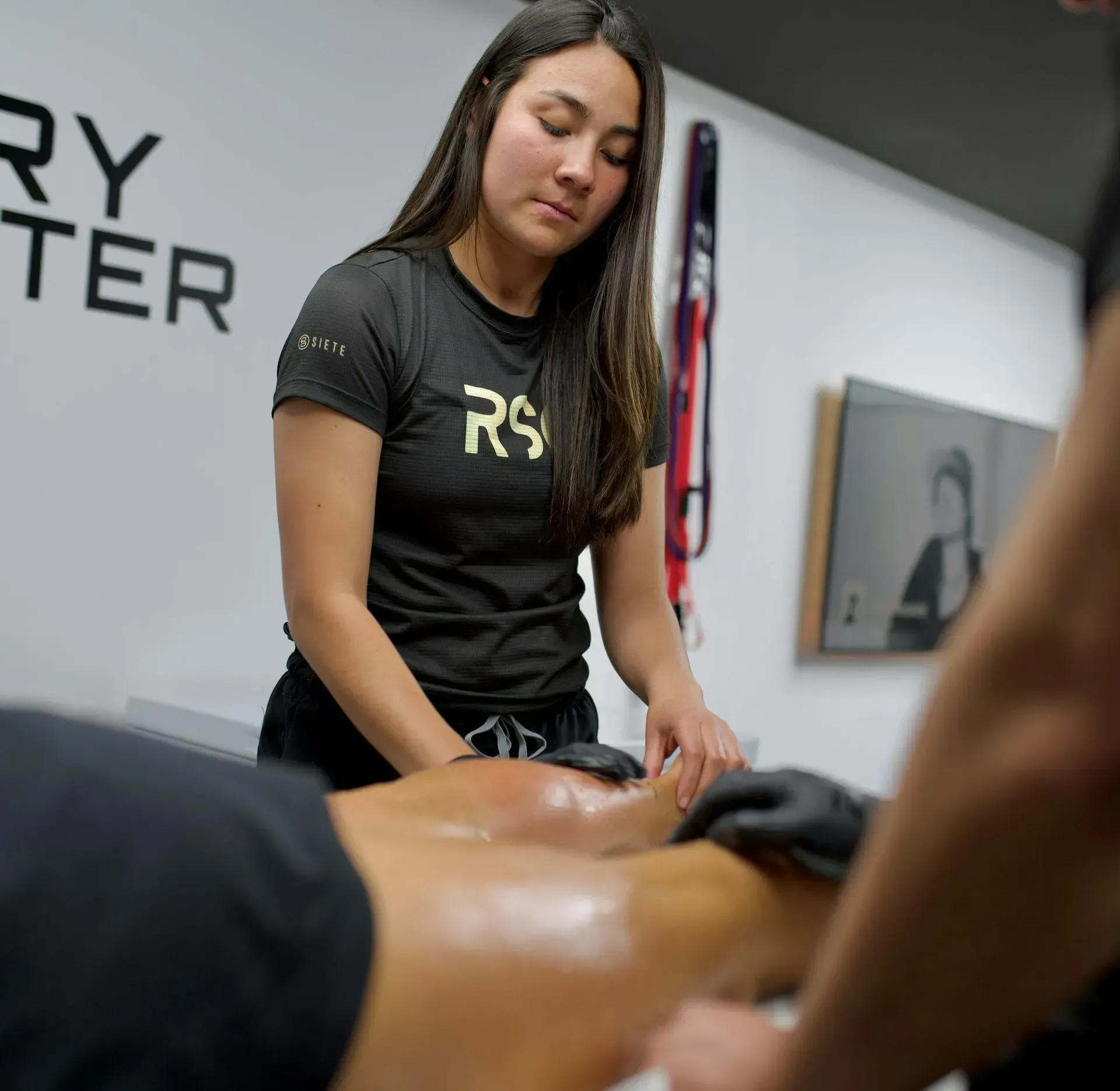 Athlete receiving a targeted sports massage treatment.