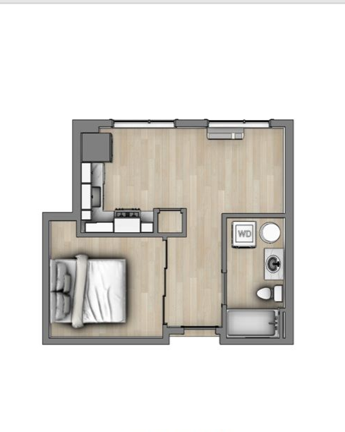 Floor plan of a compact studio apartment with bed, kitchen, and bathroom labeled E1.