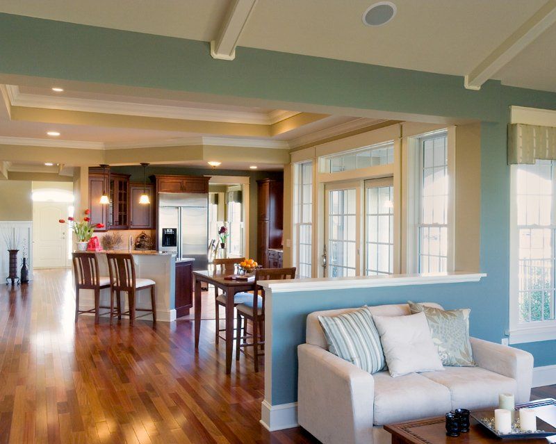 A living room with a couch and a table in it