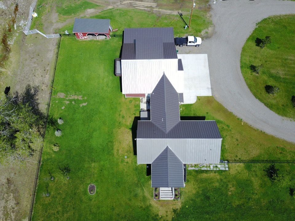 House & Car Top View — Billings, MT — Empire Roofing Inc