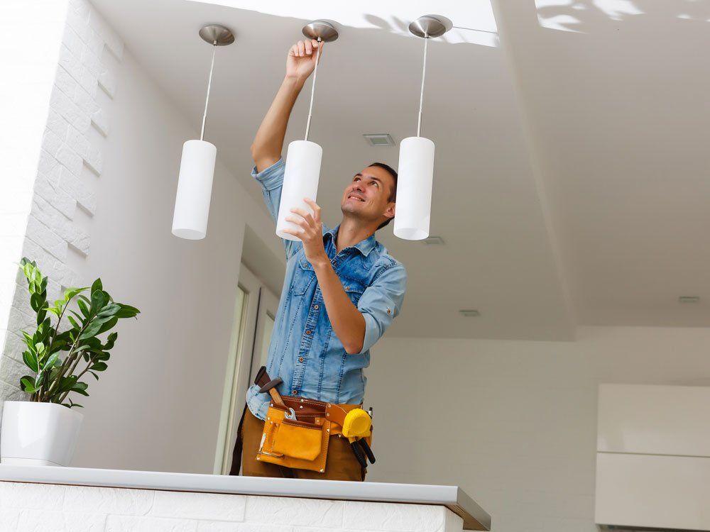 Electrician Fixing Light On Ceiling — Lebanon, PA — Mid Penn Electrical Services