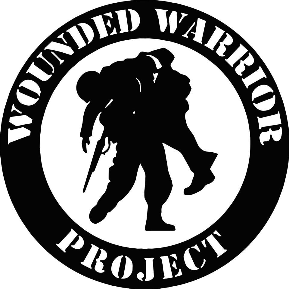 Circle logo: Silhouette of soldier carrying another soldier, 