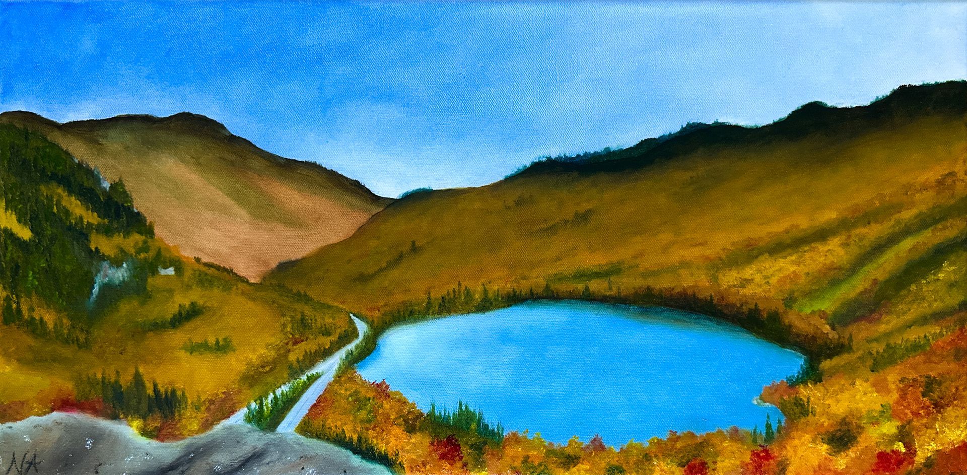 Mountain valley with a bright blue lake, winding path, and green-brown hills under a clear sky