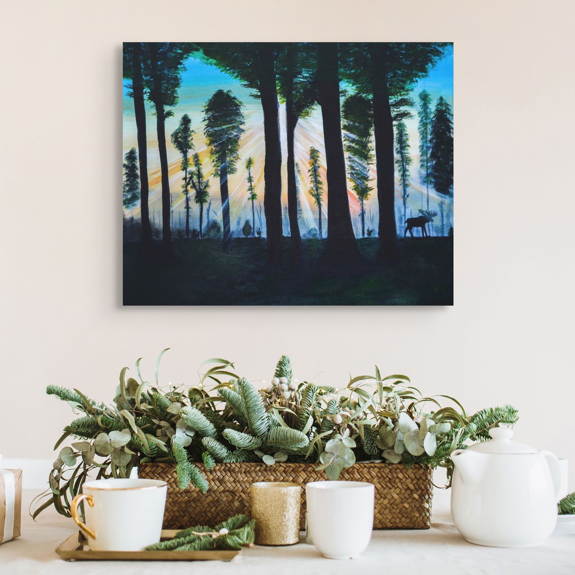 A living room with a painting of trees on the wall