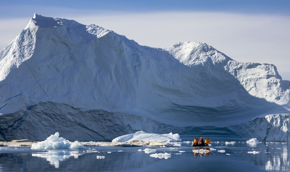 Zodiac among icebergs