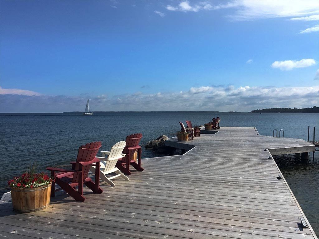 Dock and chairs on Lake Simcoe at the Briars Resort