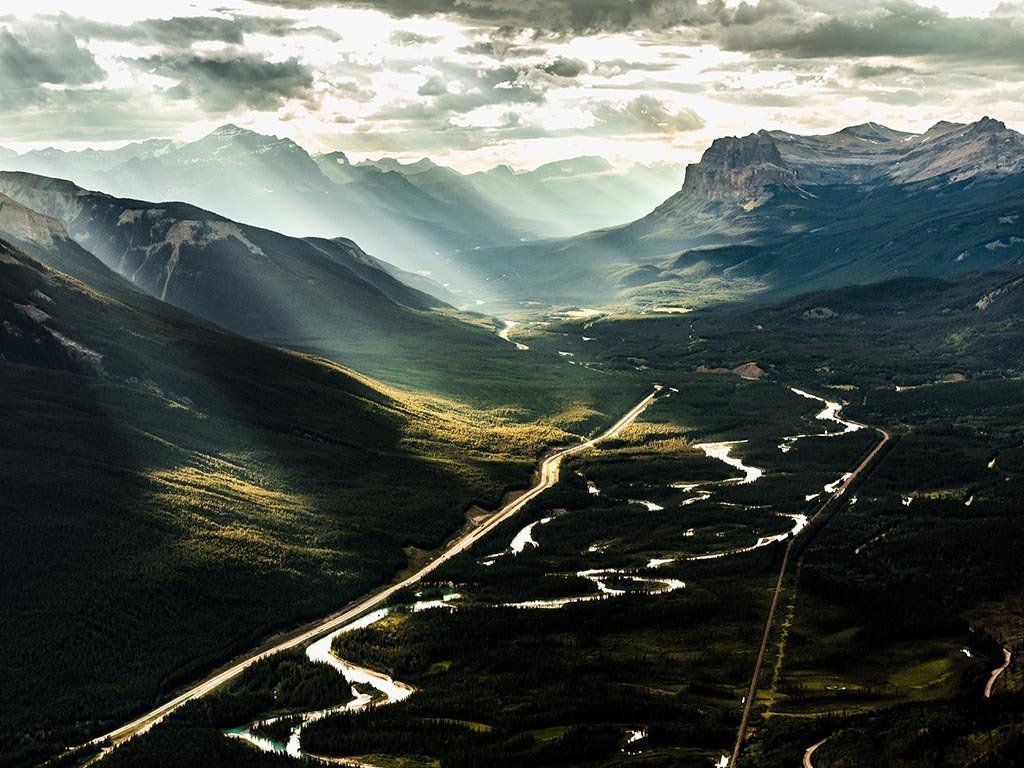 Bow Valley Parkway surrounded by Mountains in Banff National Park