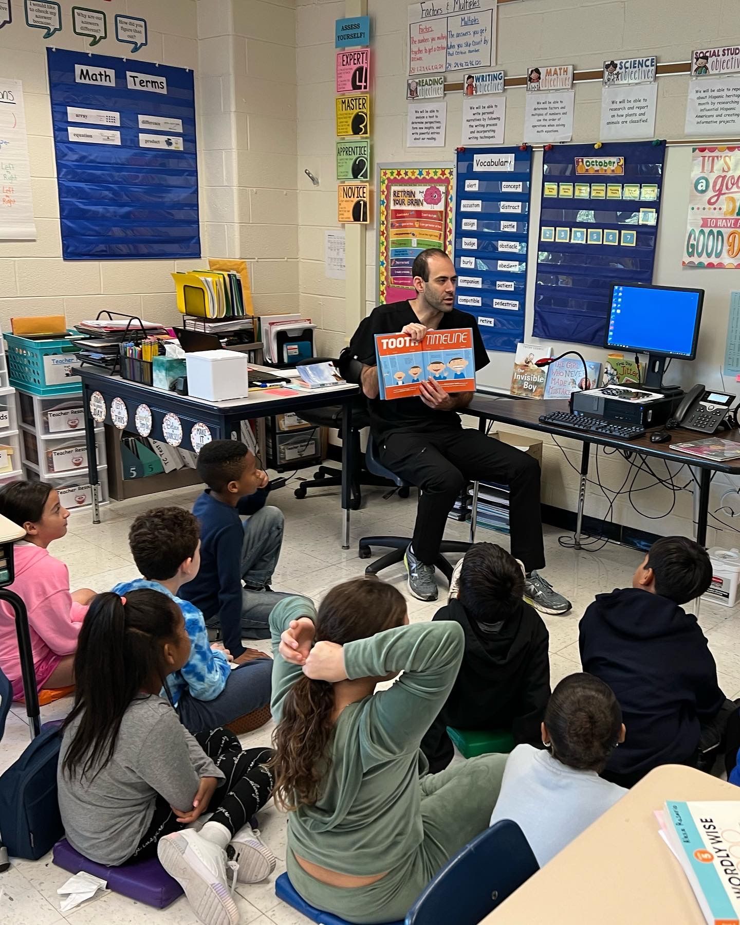 Dr. Chinitz Reading to Children at School | Orthodontist for Children in New Rochelle 10804 | Fix Bite Issues and Get Braces