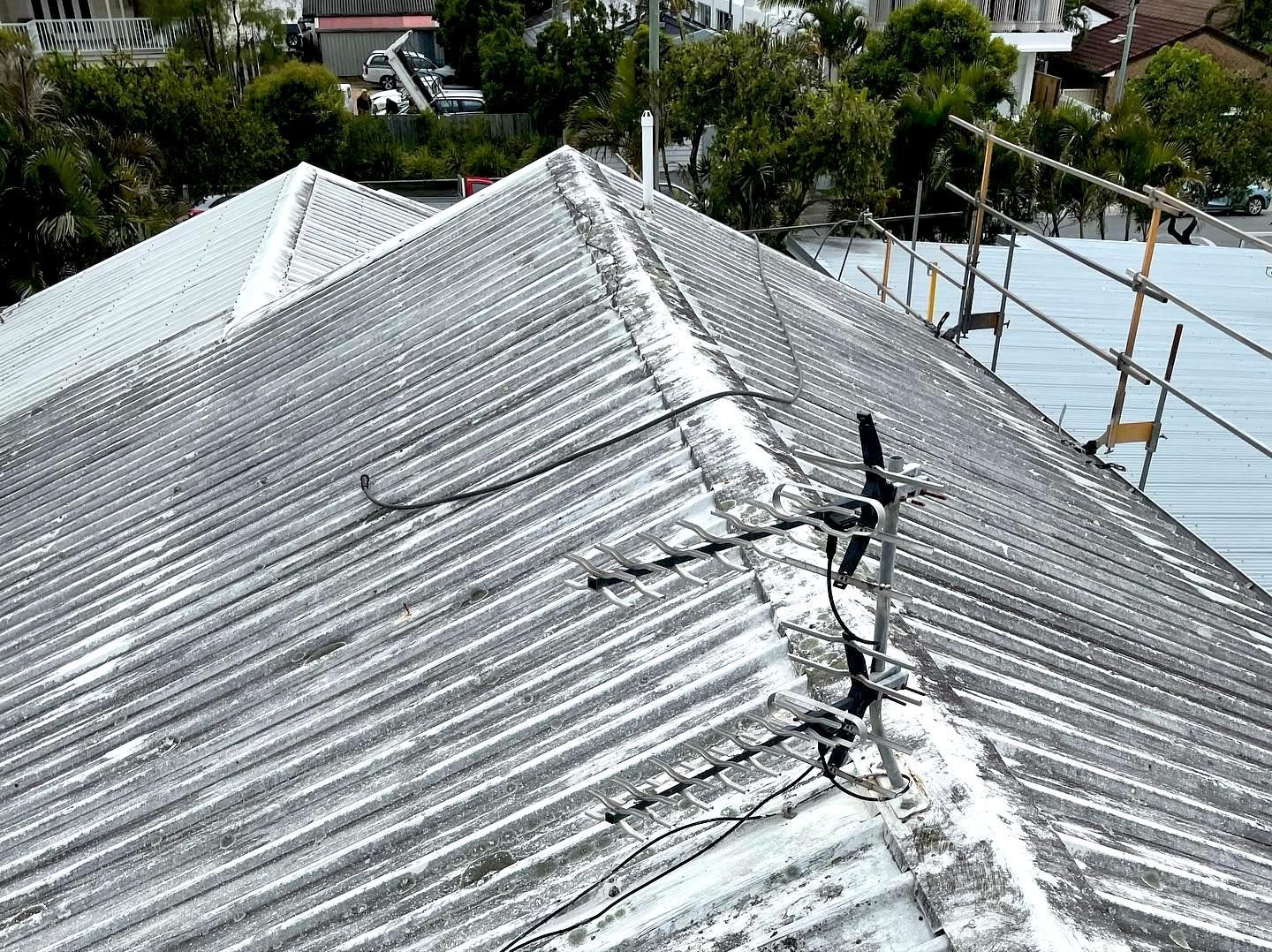 Before image of a metal roof — Roof Repairs in Southport QLD