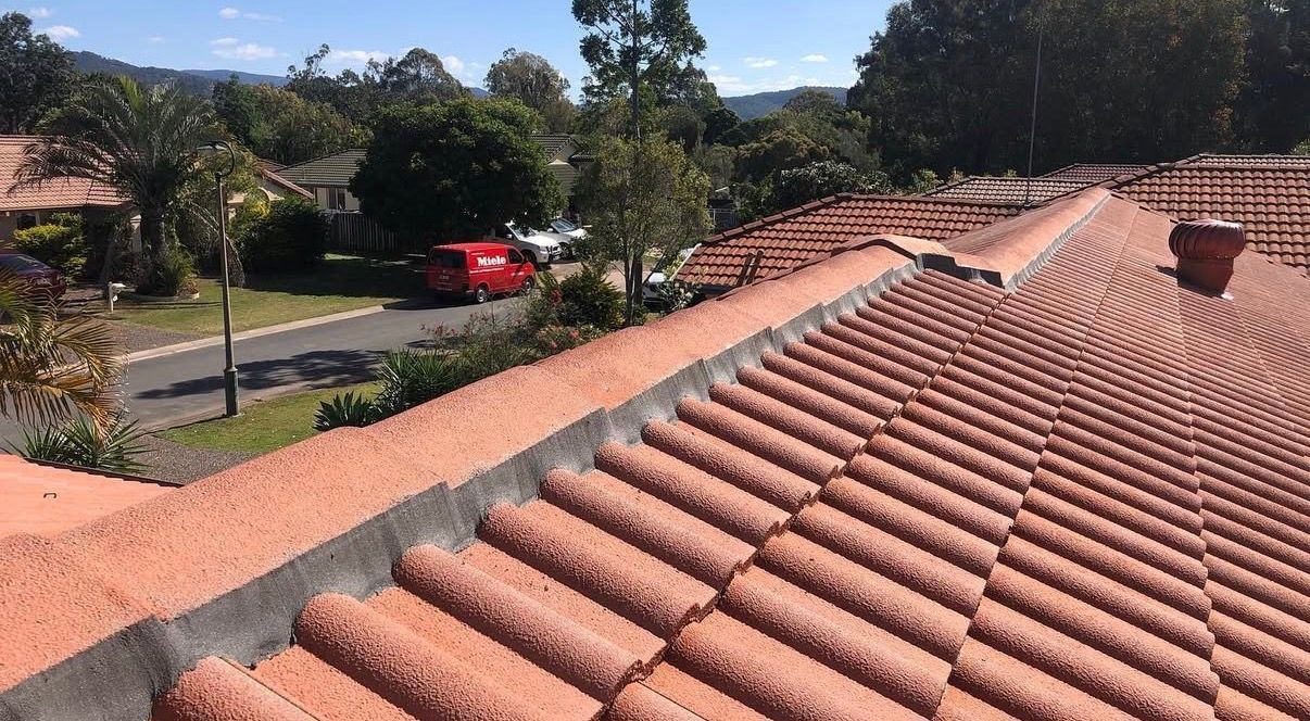 Hammer-assisted Roof Restoration — Roof Repairs in Southport QLD