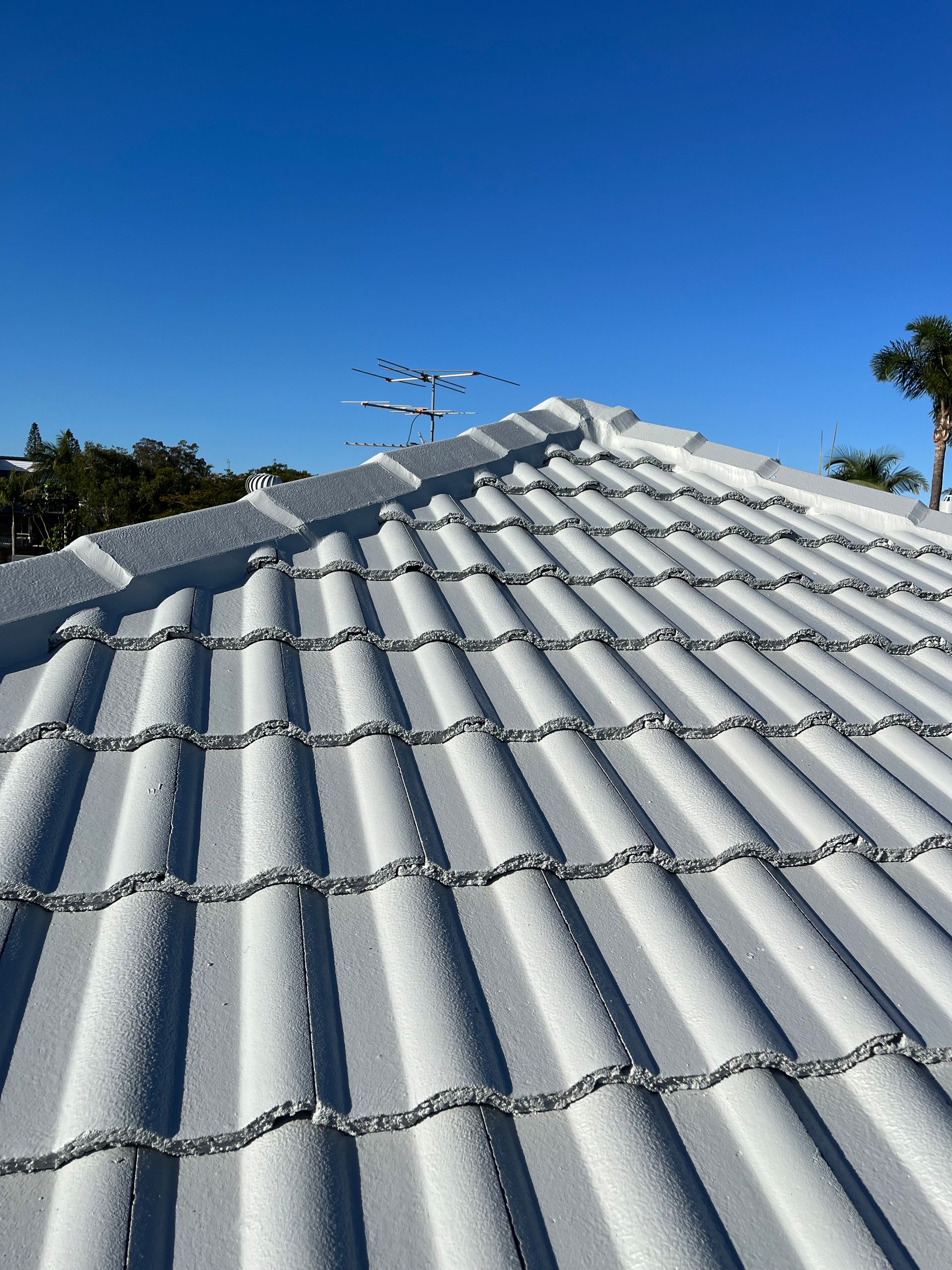 New Home's Roof showcasing Johnston & Johnston Restoration Expertise — Tile Roof Restoration in Southport QLD