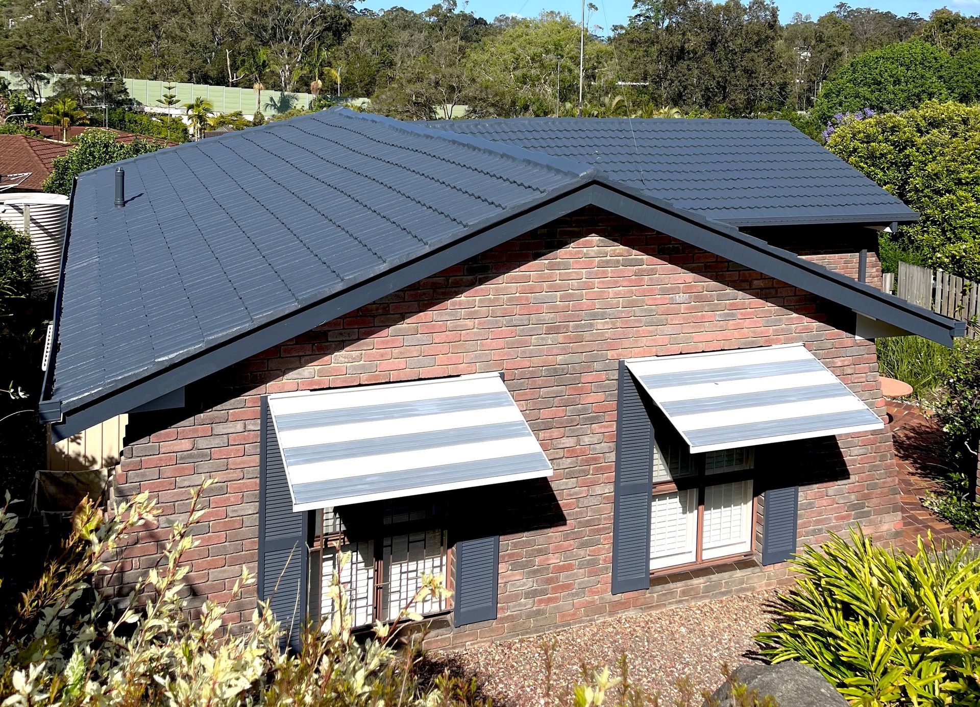 Painting the roof of the Building — Roof Painting in Southport QLD