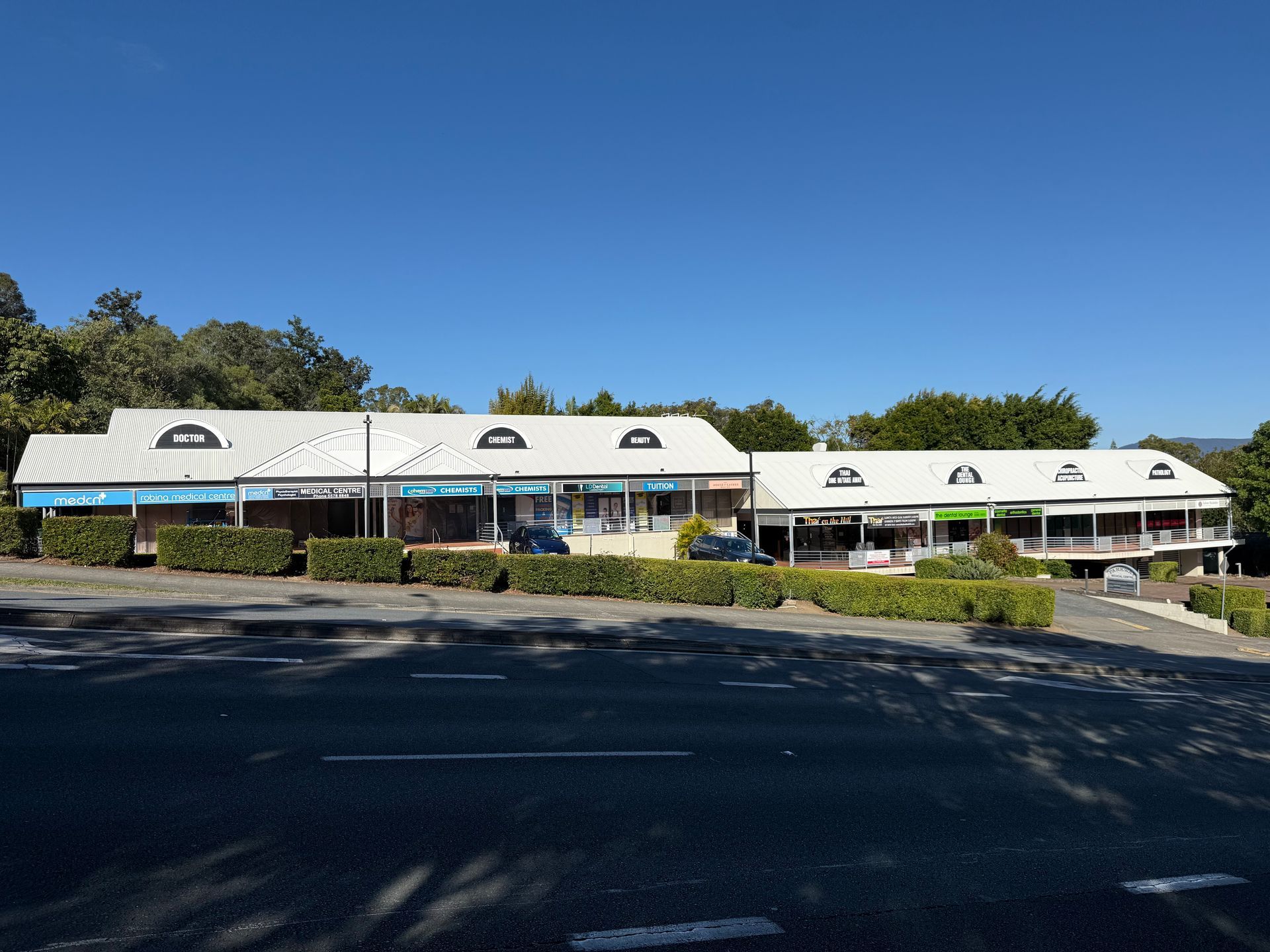 Grainy Texture of brown metal roof tiles — Roofer in Southport QLD