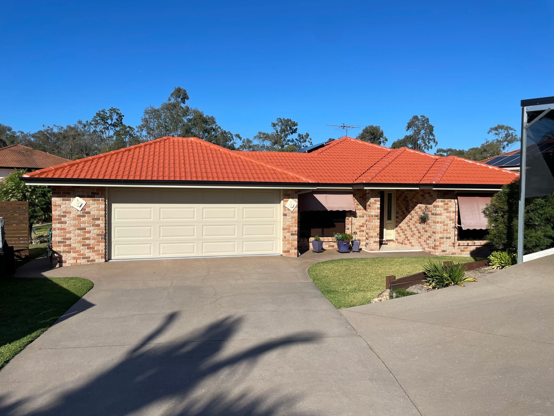 New red tiled roof — Roofer in Southport QLD