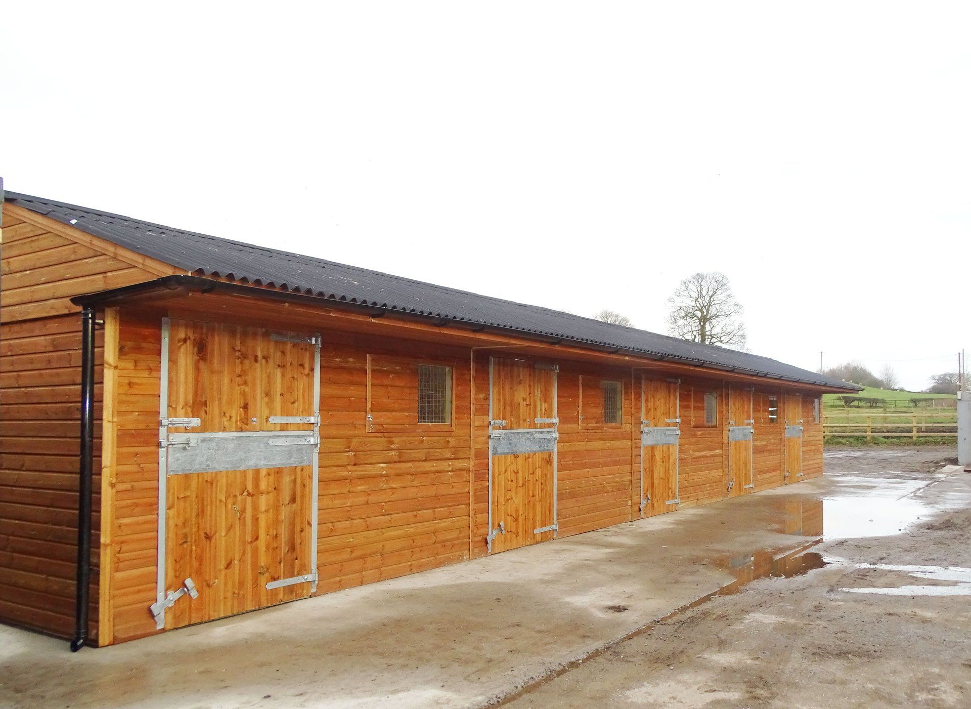 large wooden stable block