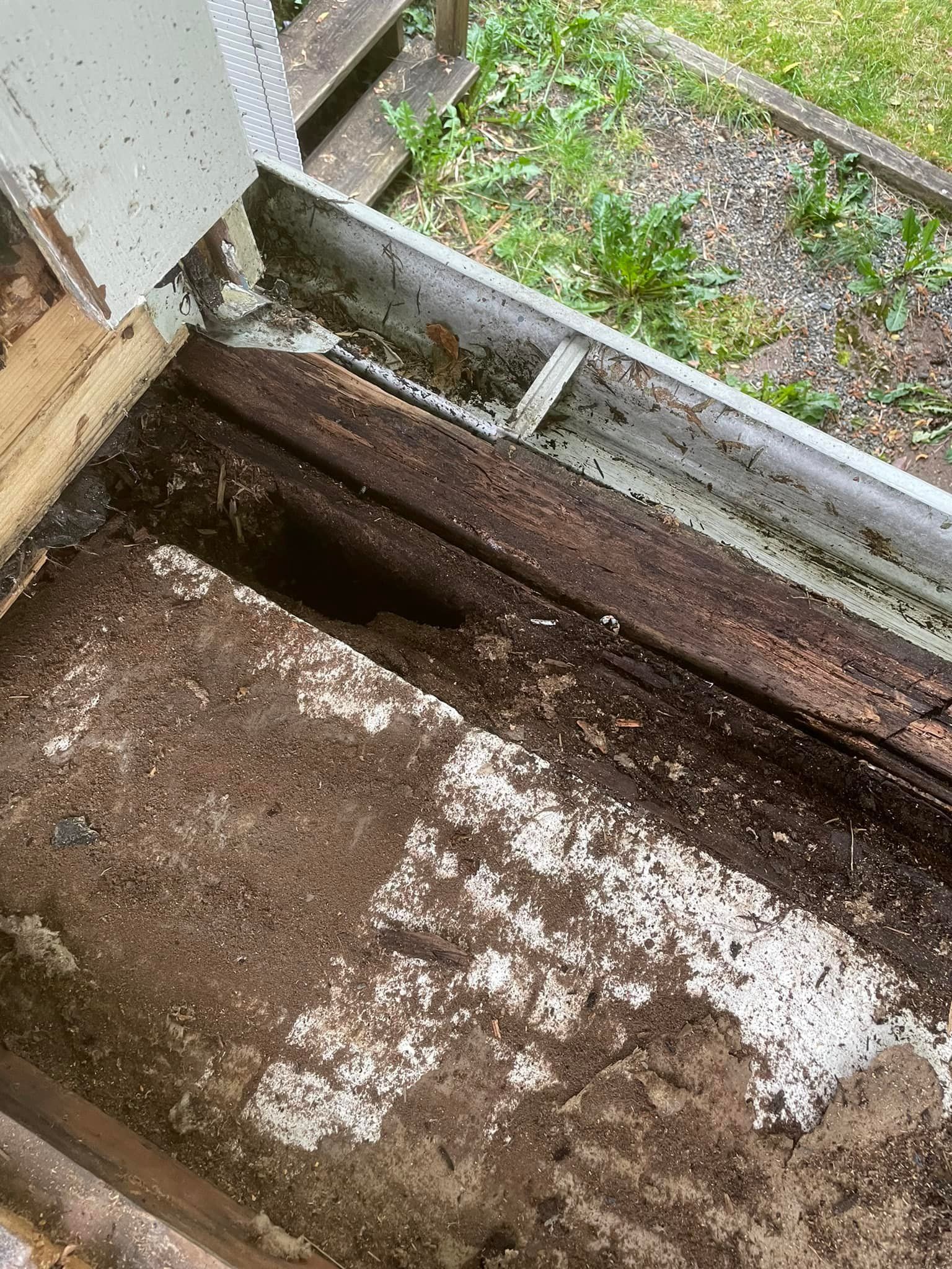 A wooden box with a hole in the middle of it.