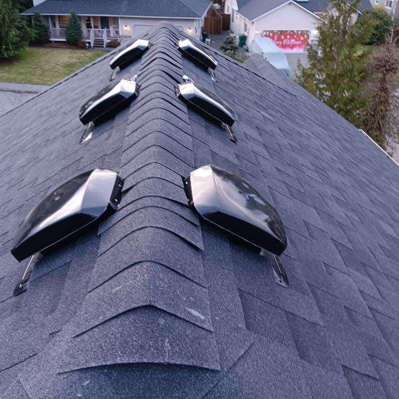 A roof with a lot of vents on it