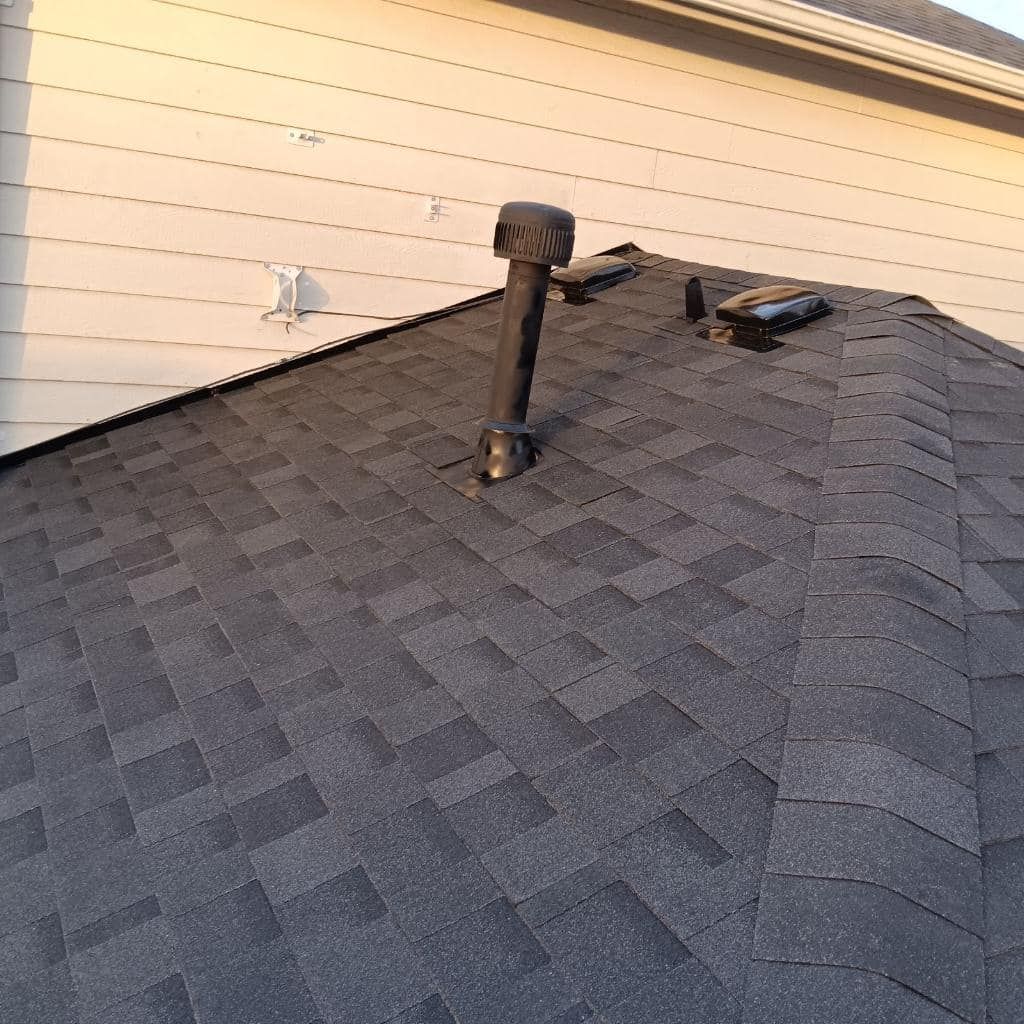 A roof with a chimney on top of it