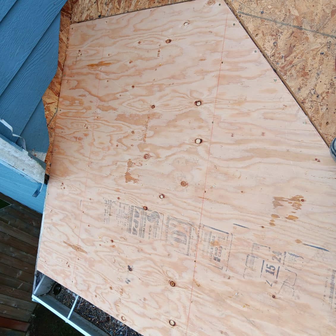 A piece of plywood that says ' a ' on it