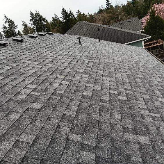 A close up of a roof with shingles on it.