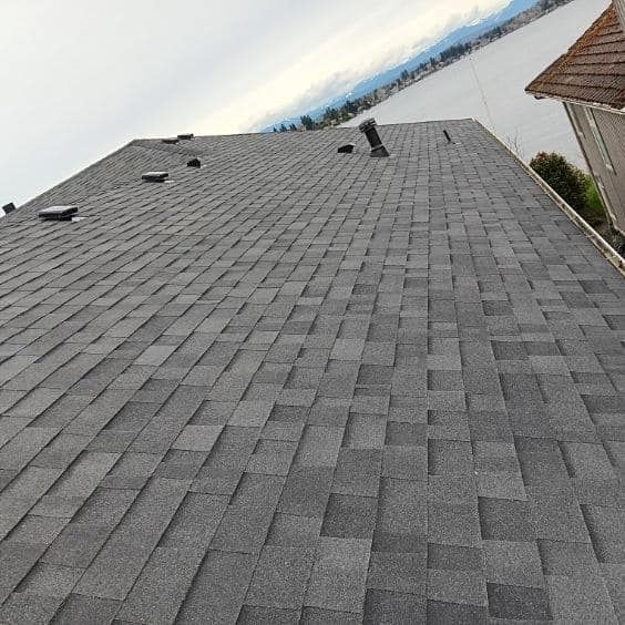 A close up of a roof with shingles on it.