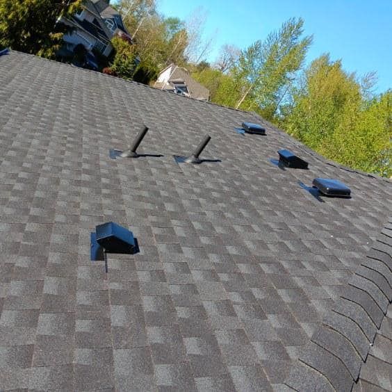 A roof with a lot of vents on it
