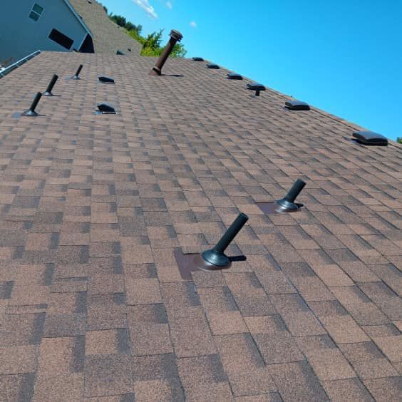 A roof with a lot of vents on it