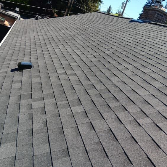 A close up of a roof with shingles on it