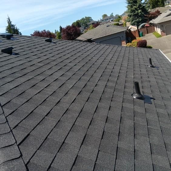 A close up of a roof with a chimney on it