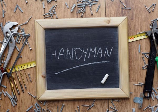 Saskatoon Handyman Services Sign with tools and supplies