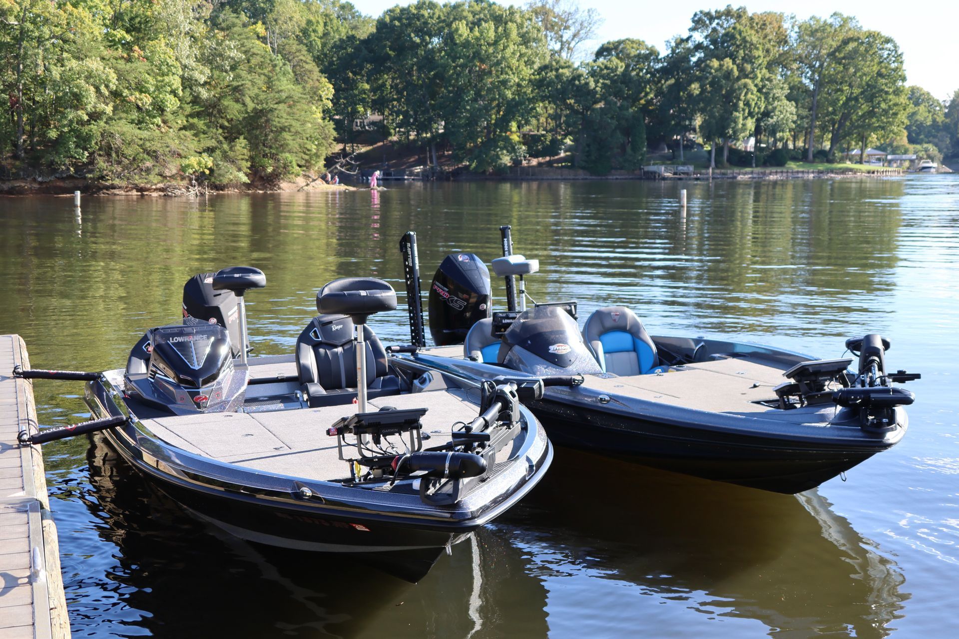 Two bass boats tethered by the Dock D-Fender to the Dock and another set allowing the two boats to stay secured side by side without damaging or rubbing against each other