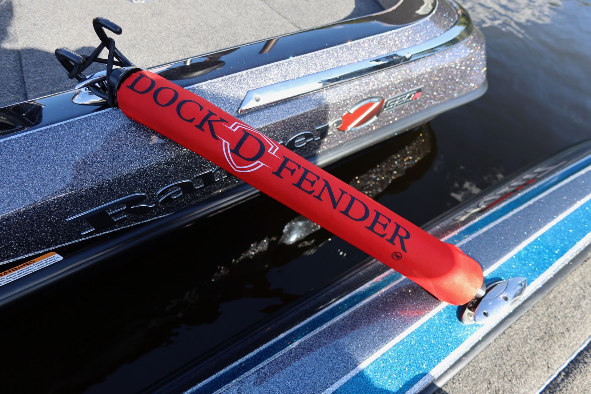 Red Dock D-Fender boat fender and sleeve connected between two bass boats with most recent sleeve design and branding
